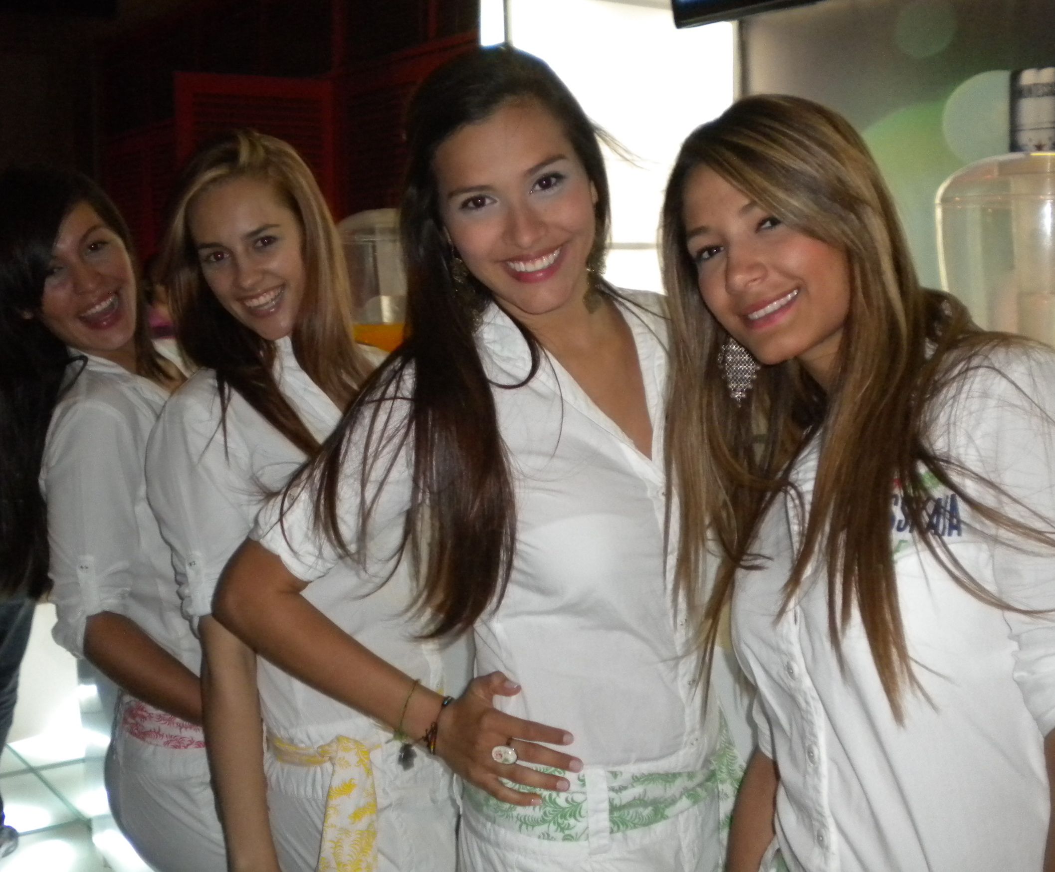 Girls handing out shots Girls handing out shots