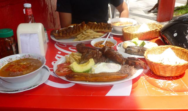 Customer at La Gloria de Gloria: "Yeah, I'll have today's special. Wait, let me call two friends to help me finish all this food." 