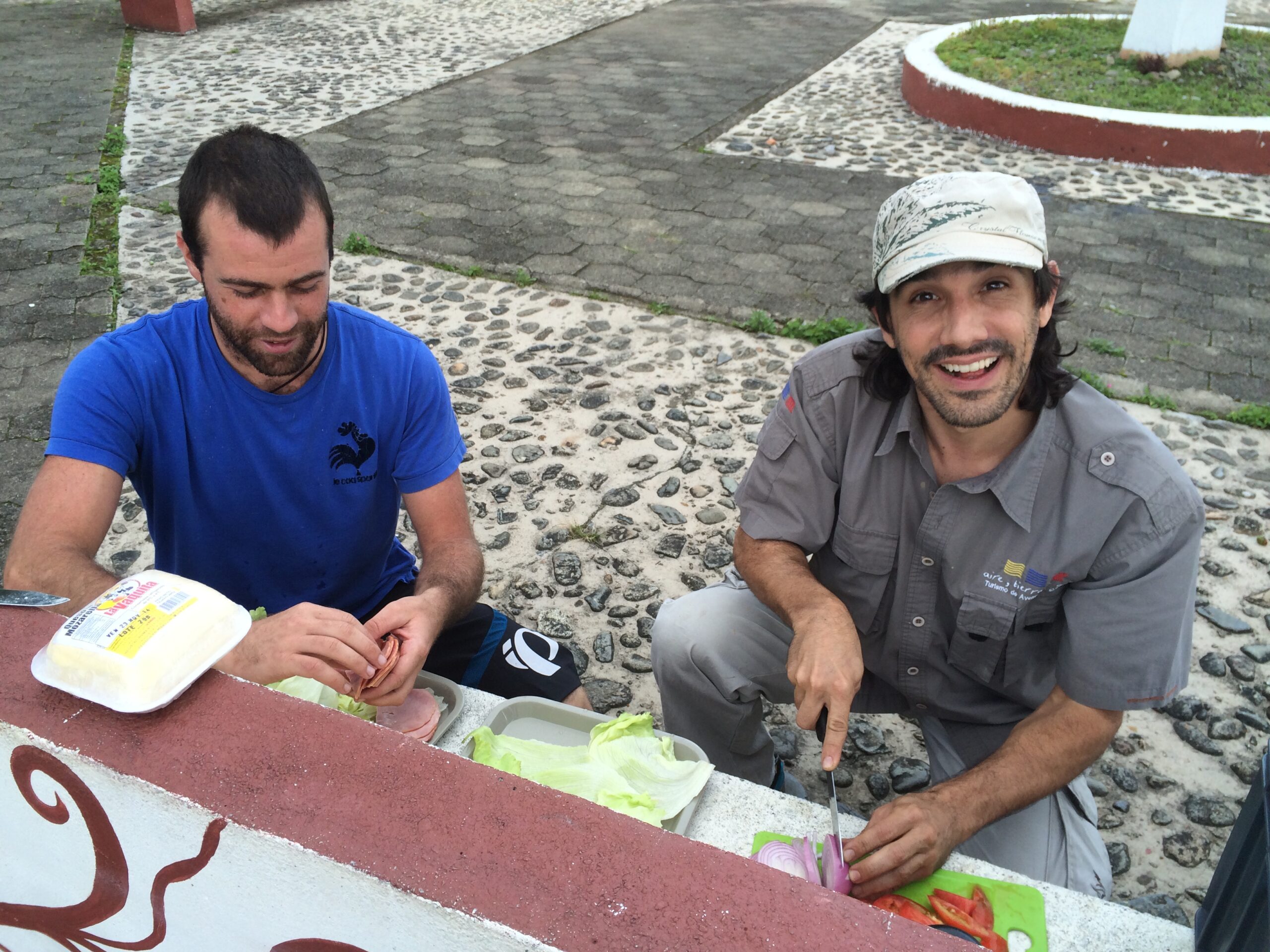 Guides Guides prepping lunch on mountain biking tour.