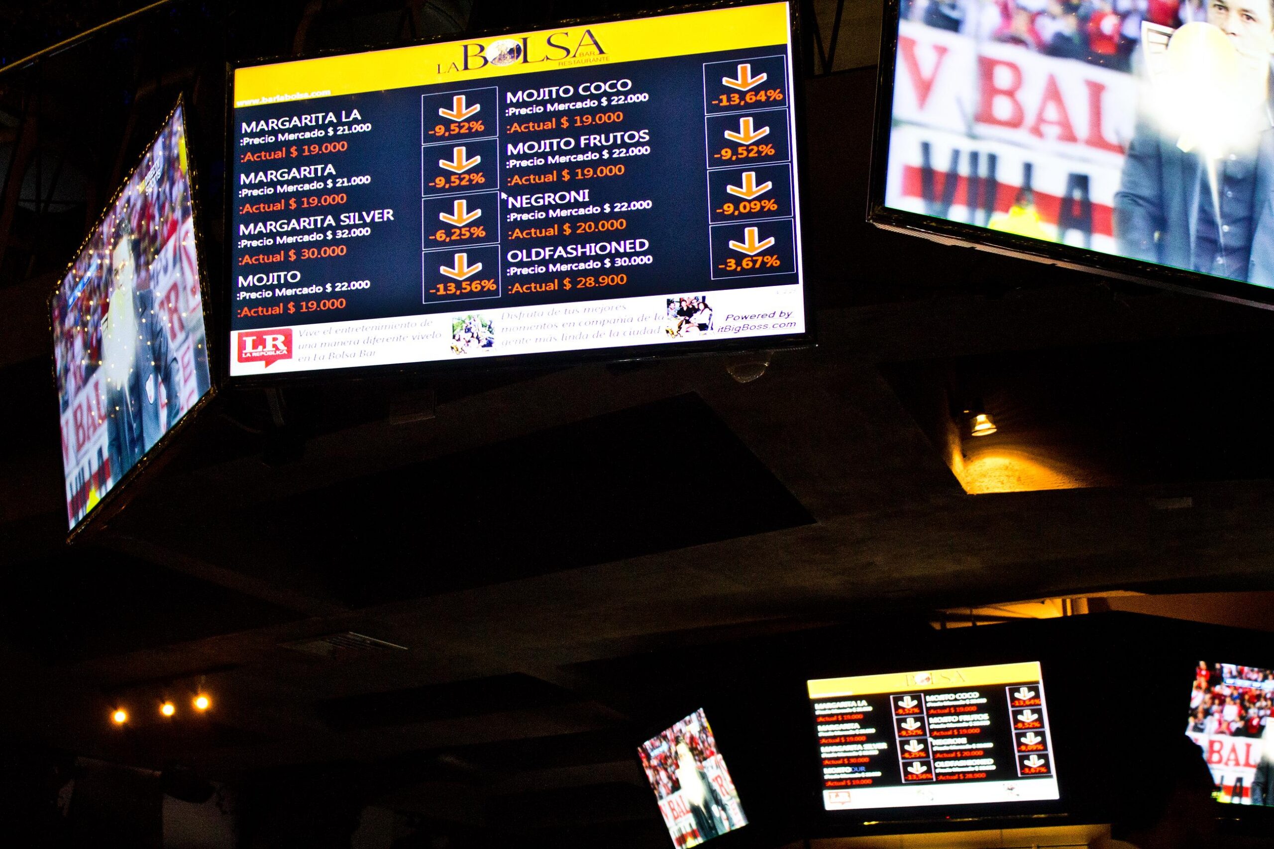 Screens Screens that showed the "crashing" prices of alcohol at the restaurant that night.