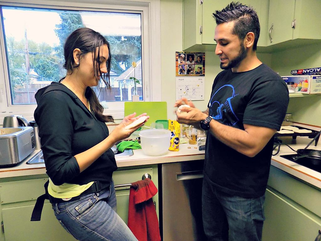 Marta and Andrés Marta and Andrés making arepas in Saskatoon.