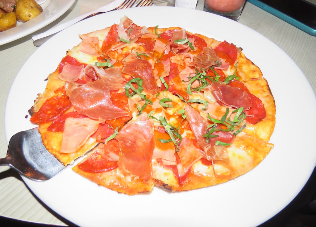 Four meats pizza at Delaire