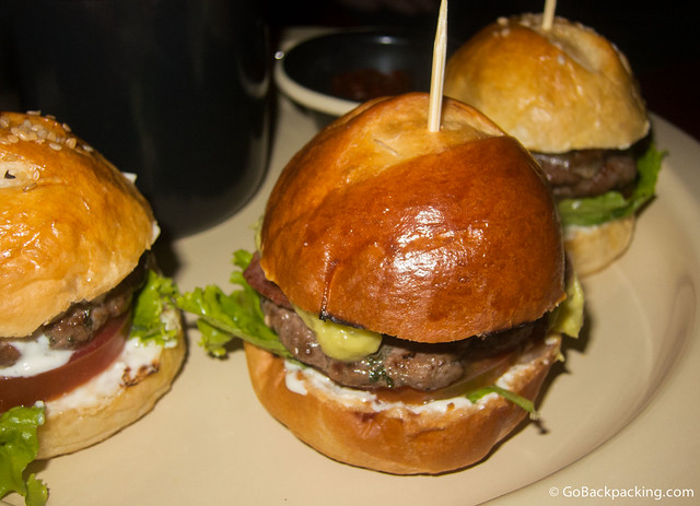 Mini-burgers Three mini-burgers, each with a different topping
