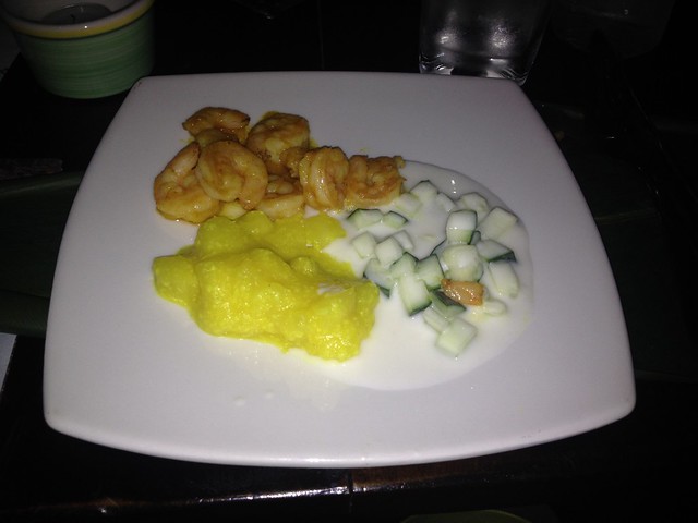 Shrimp Shrimp in mildly spicy red sauce, cucumbers in yogurt, and mango