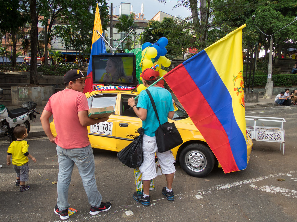 Taxi A taxi driver having some fun with the 2014 World Cup