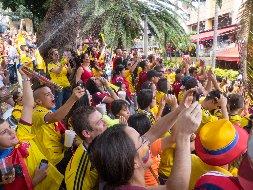 Singing Colombians sing their national anthem ahead of the Brazil match