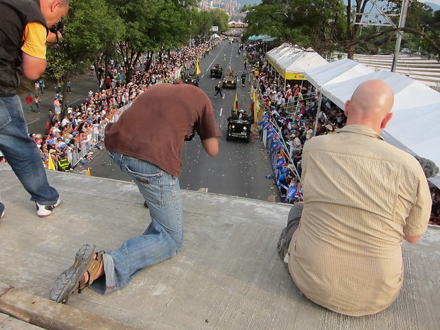 Troy (left) and Drew (right) taking advantage of our good views atop the bridge to photograph and video the parade. Troy (left) and Drew (right) taking advantage of our good views atop the bridge to photograph and video the parade.