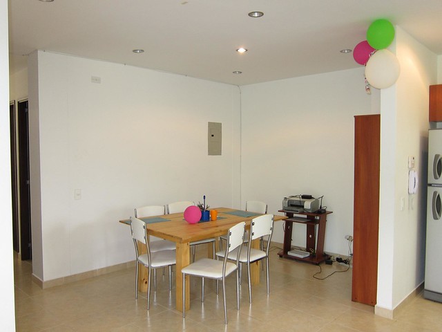 The kitchen table is a common workplace as the wireless internet router is nearby. The kitchen table is a common workplace as the wireless internet router is nearby.