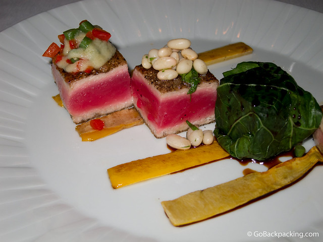Black pepper crusted bluefin tuna with sea salt, apple guava vinaigrette, and white bean salad. Black pepper crusted bluefin tuna with sea salt, apple guava vinaigrette, and white bean salad.