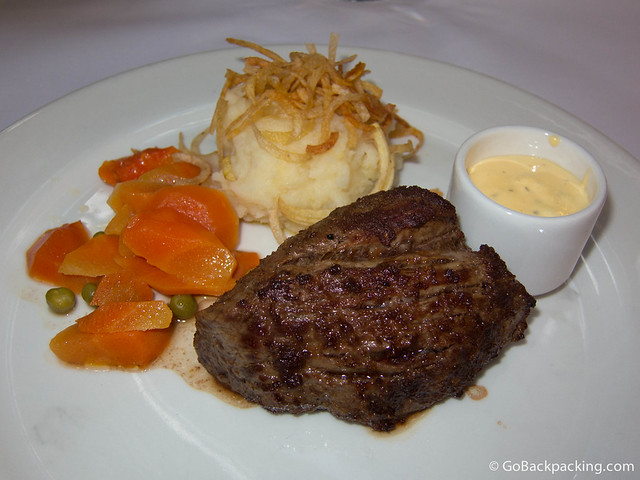 Filet mignon Filet mignon with Bernaise sauce, mashed potatoes, and vegetables