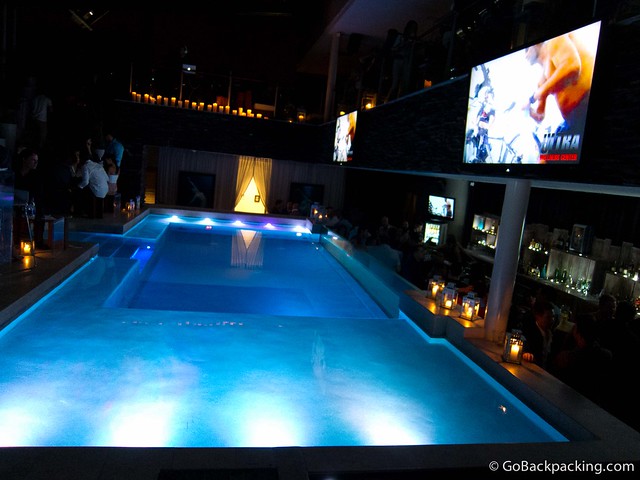 Candles around the pool add ambience at night