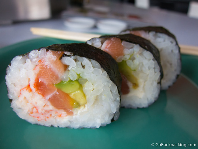 Roll with salmon, crab, avocado, and cheese