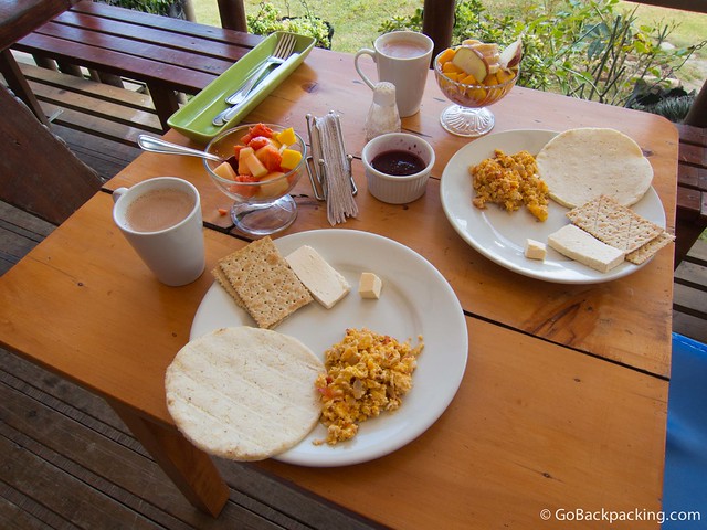 Typical Colombian breakfast Typical Colombian breakfast: arepas, eggs with onion and tomato, cheese, fruit salad, and coffee or hot chocolate