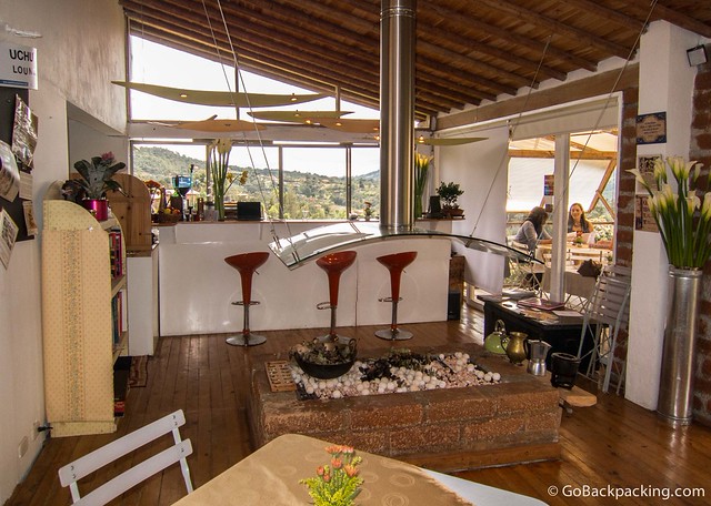 Inside Uchuva Lounge The interior features a modern fireplace, and local art hanging on the walls