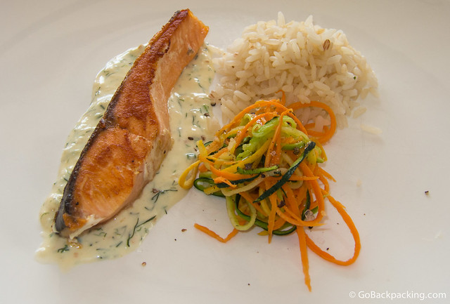 Salmon and rice Third course: perfectly cooked salmon with rice and vegetable salad