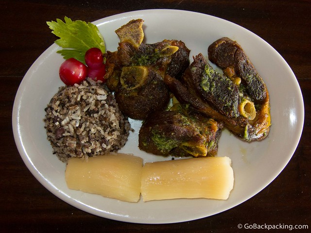 Chicamocha goat Chicamocha goat marinated with local herbs, and served with yucca, rice, and red hot onions