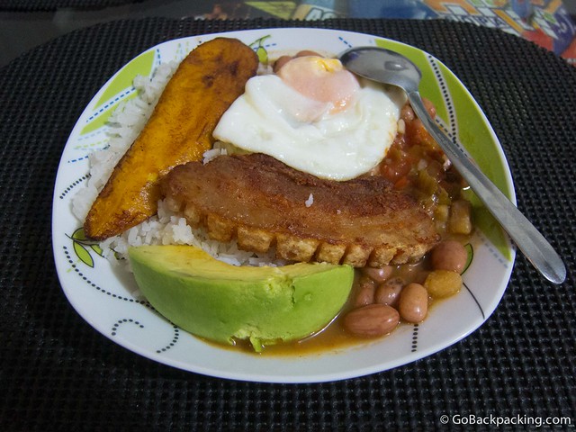 Dinner The finished product: beans, chicharron, a fried egg, avocado, rice, and plantain